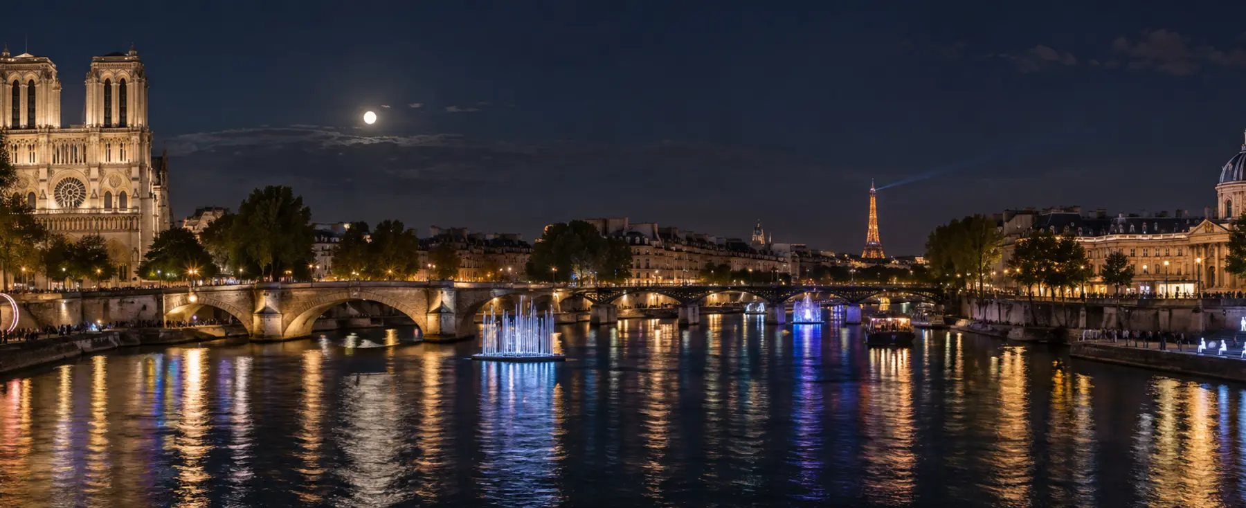 Panorama nocturne de la Seine et de Paris ponctué d’installations lumineuses