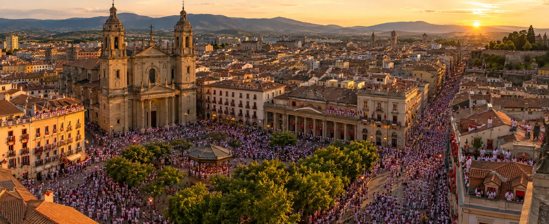 Panorama de la vieille ville de Pampelune animée par les fêtes de San Fermín au coucher du soleil